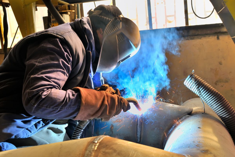 A professional welder from Weld East Fabricators conducting Tungsten Inert Gas (TIG) Welding.